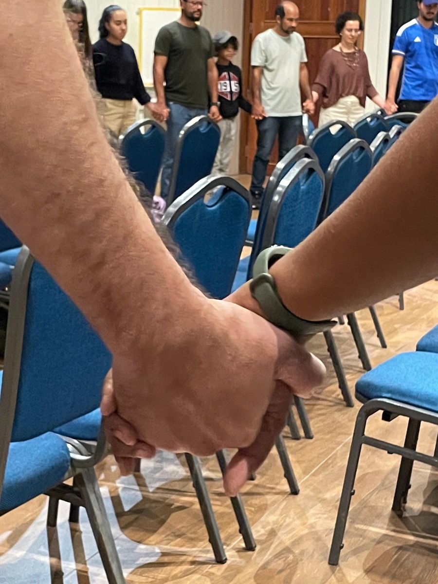 Maos unidas em oracao